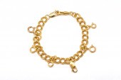 A GOLD TWIN CURB LINK BRACELET