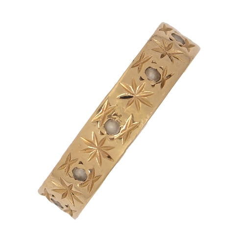A gold wedding ring, marked 18ct,
