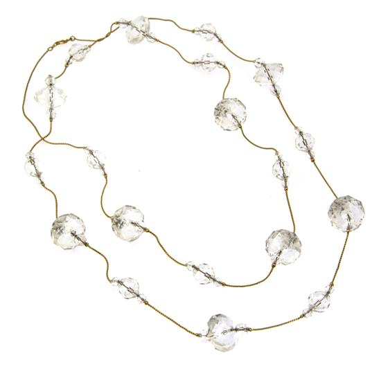 A Goldtone and Crystal Bead