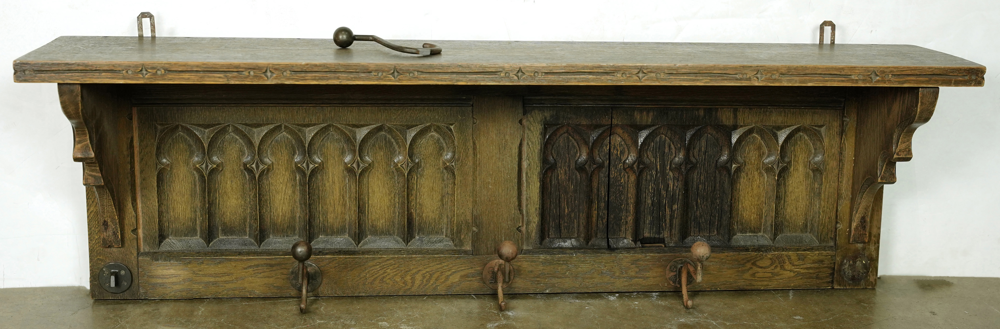 A GOTHIC REVIVAL OAK COAT RACK A