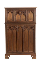 A GOTHIC REVIVAL OAK CUPBOARD