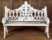 A GOTHIC STYLE IRON AND WOOD G