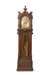 A GOTHIC-STYLE TALL CASE CLOCK