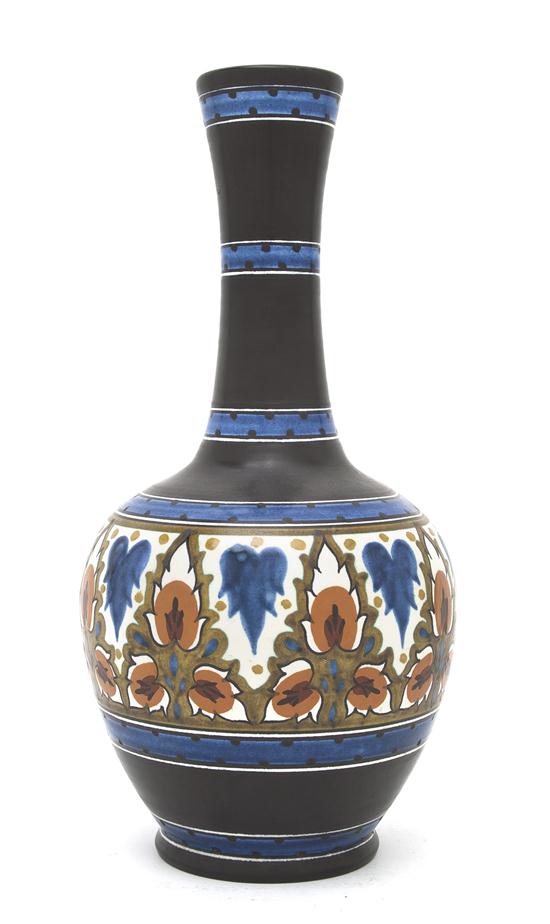A Gouda Pottery Vase of bottle form