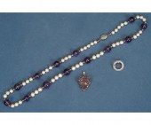 A graduated cultured pearl, am