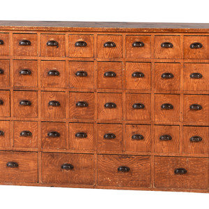 A Grain Painted Pine 36-Drawer