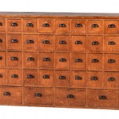A Grain Painted Pine 36-Drawer