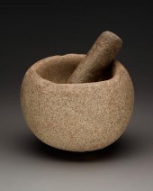A GRANITE MORTAR AND PESTLEA g