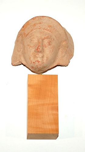 A GREEK TERRACOTTA HEAD, 4TH