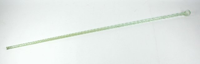 A green glass walking stick of
