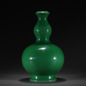 A GREEN GLAZE PORCELAIN DOUBLE