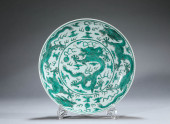 A GREEN-GLAZED 'CLOUD AND DRAG