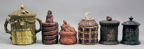 A green glazed pottery tree trunk