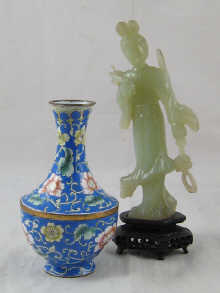A green hardstone Chinese figure on