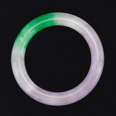 A GREEN JADEITE BANGLE 2 ¼" di