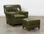 A GREEN LEATHER UPHOLSTERED CL