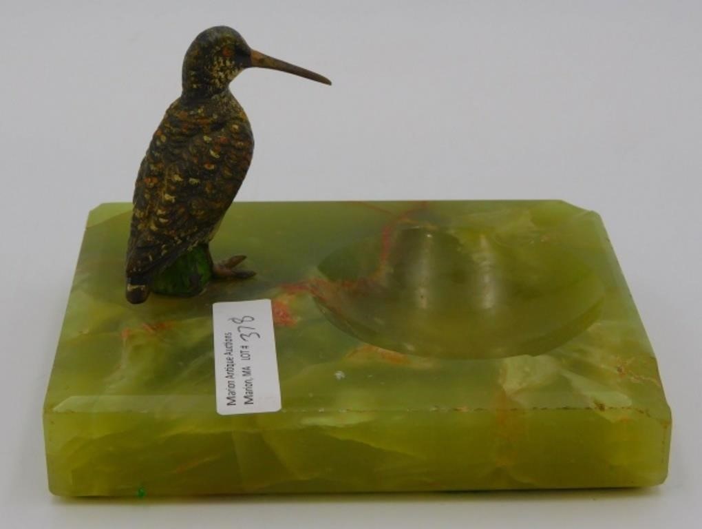 A GREEN ONYX ASHTRAY WITH