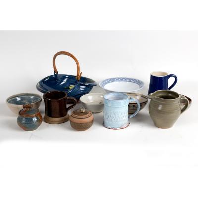 A green studio pottery jug, 12cm