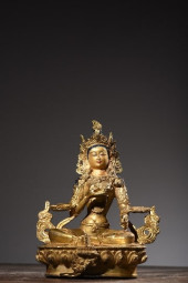 A GREEN TARA STATUE<br>A GREEN