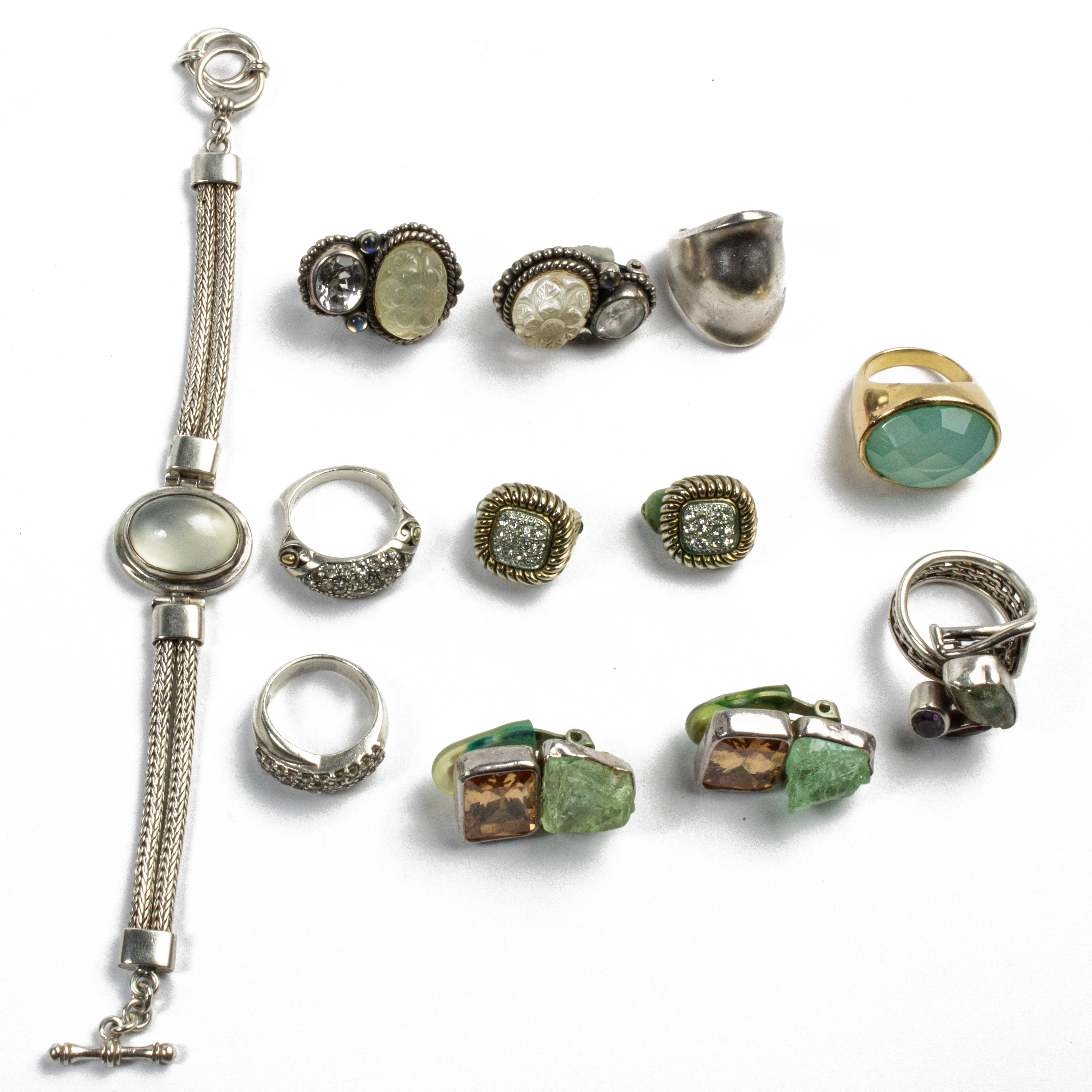 A GROUP GEMSTONE AND SILVER COSTUME