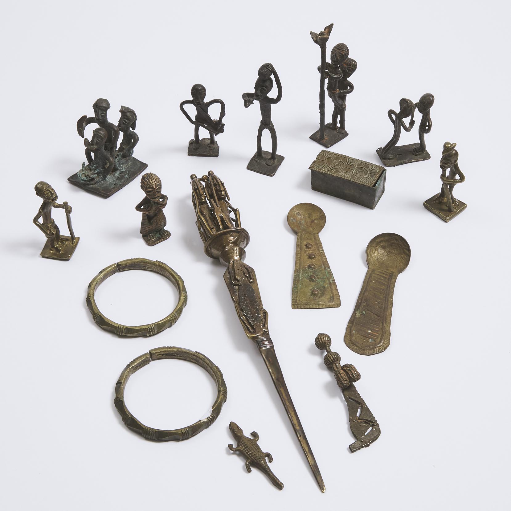 A group of 13 Akan Brass