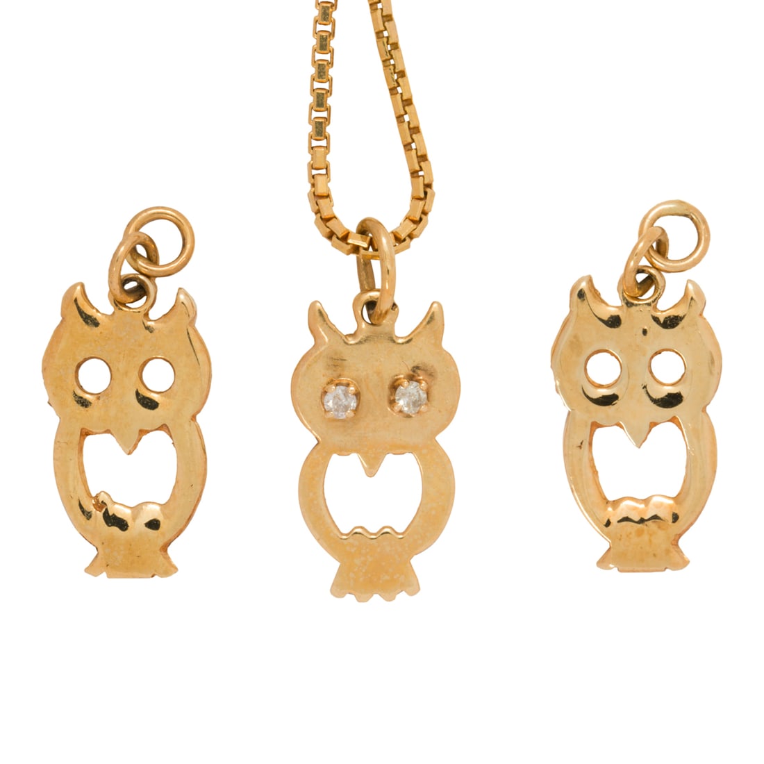 A GROUP OF 14K GOLD PENDANTS AND