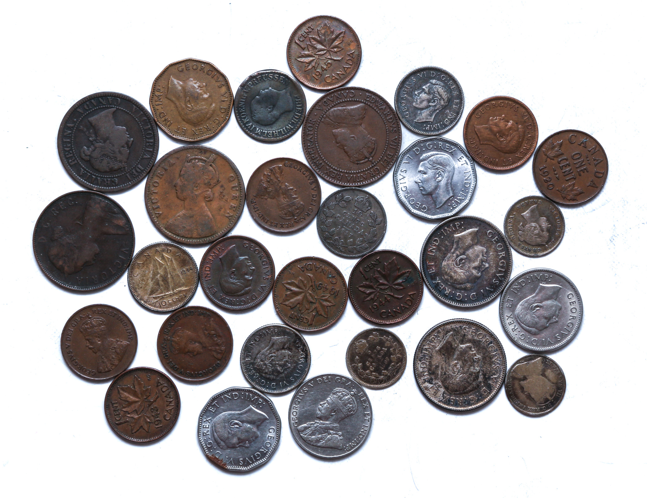 A GROUP OF 29 CANADIAN COINS WITH 9