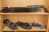 A GROUP OF AFRICAN COMBS AND M