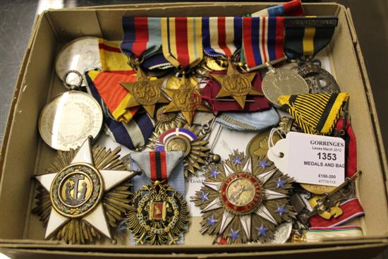 A group of assorted medals and