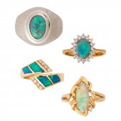A GROUP OF BLACK OPAL AND FOUR