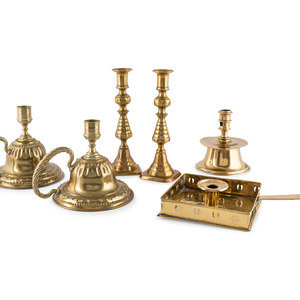 A Group of Brass Candlesticks