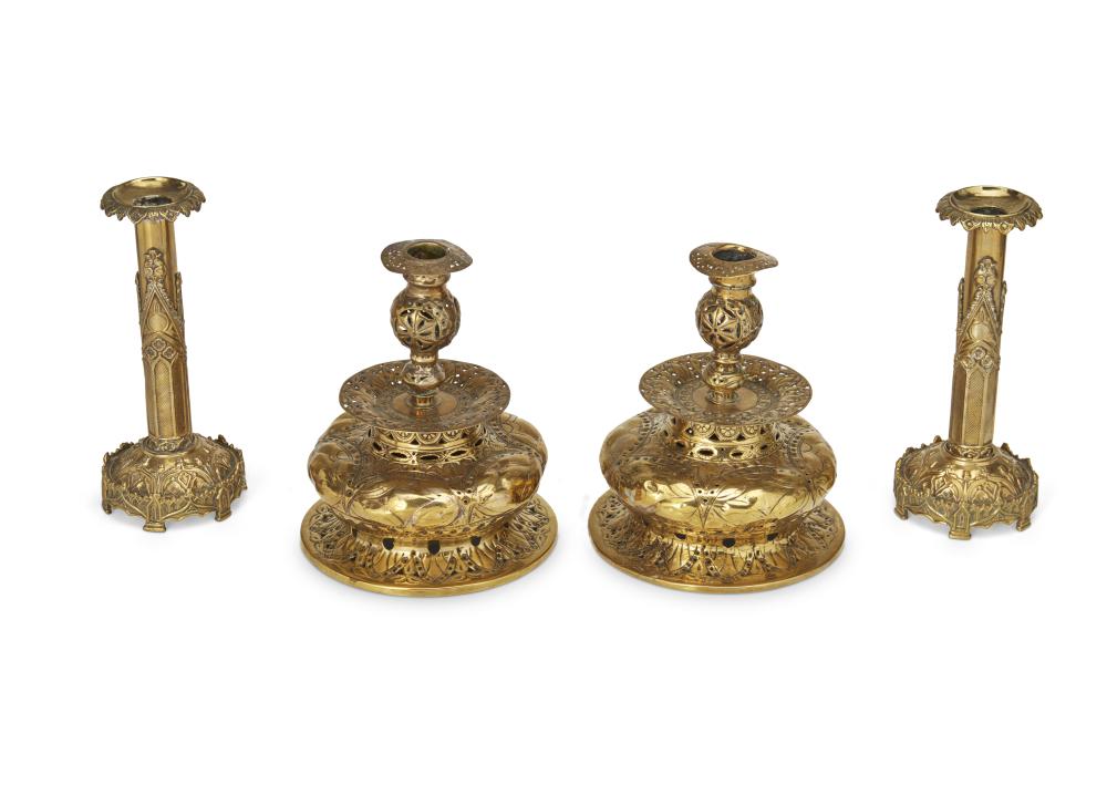 A GROUP OF BRASS CANDLESTICKSA