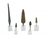 A GROUP OF BRONZE ARROW AND SP