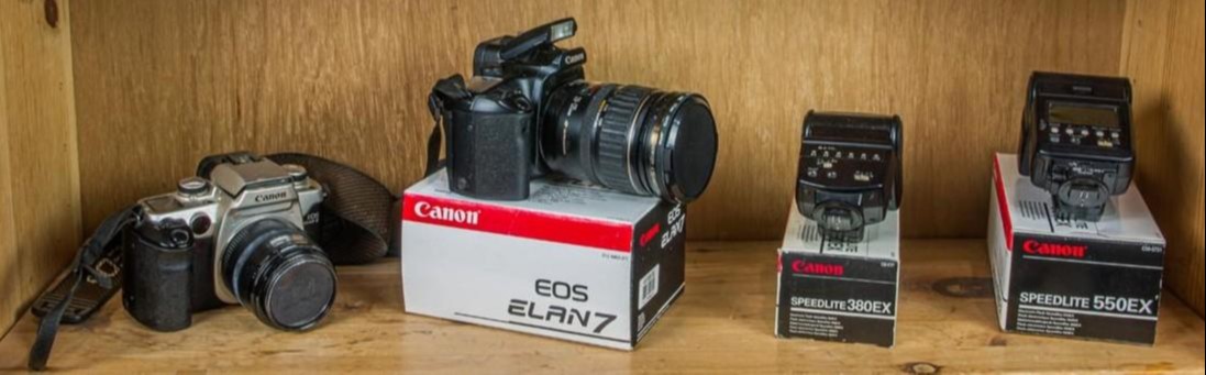 A GROUP OF CANON EOS DSLR CAMERAS