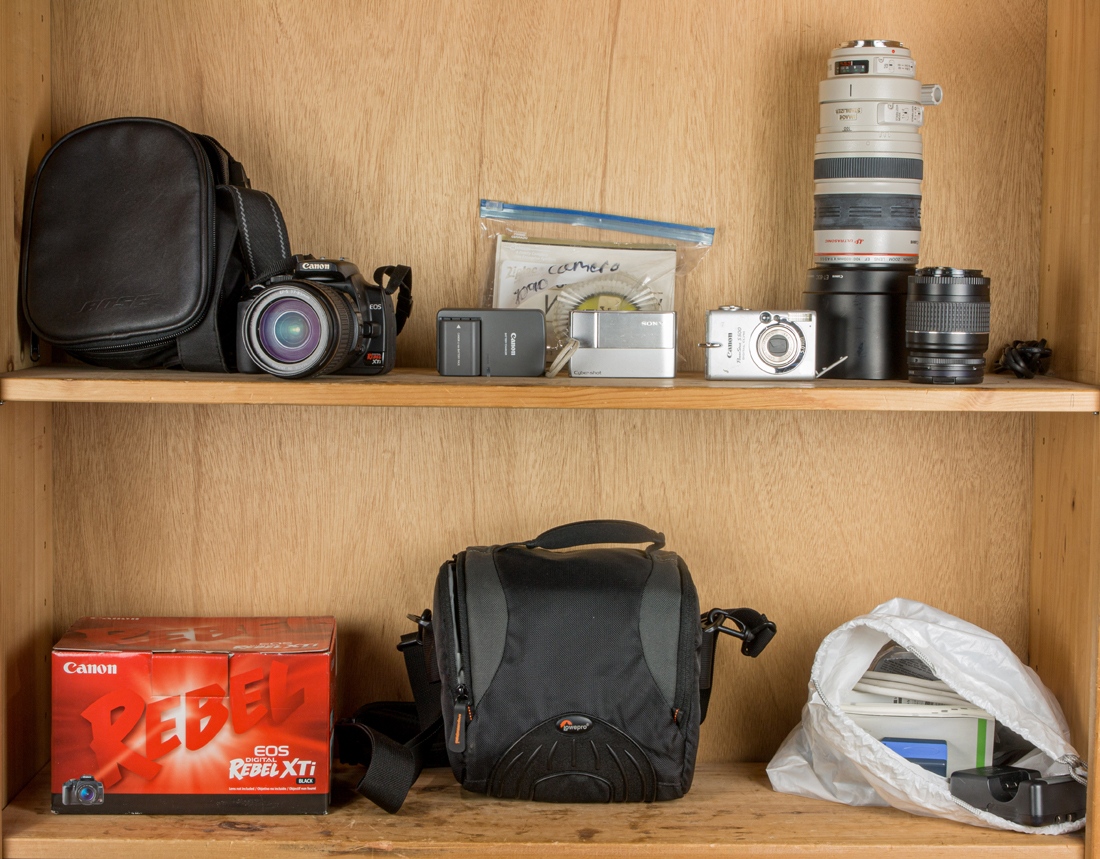 A GROUP OF CANON LENSES, CAMERA AND