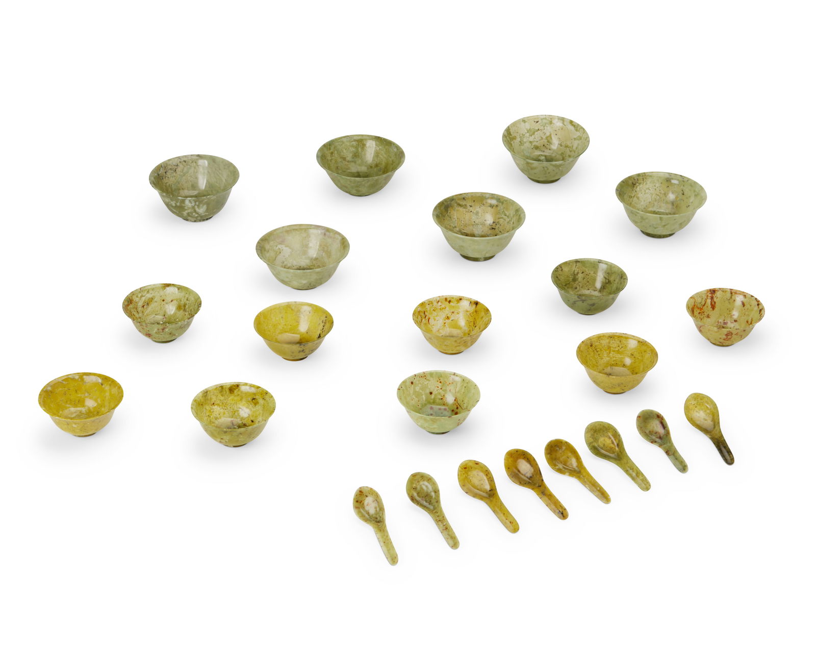 A GROUP OF CARVED STONE BOWLS AND