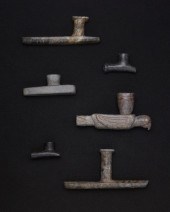 A GROUP OF CARVED STONE PIPESA
