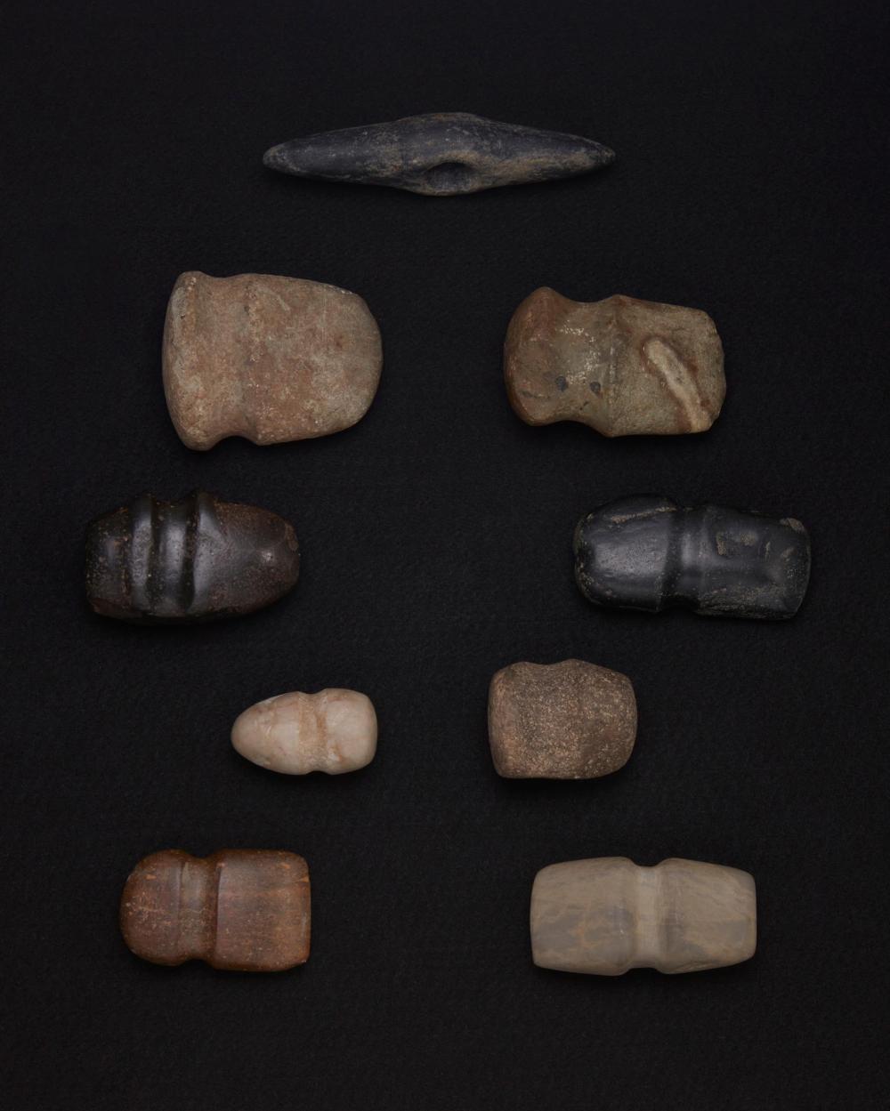 A GROUP OF CARVED STONE AXESA group