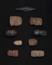 A GROUP OF CARVED STONE AXESA