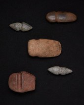 A GROUP OF CARVED STONE AXESA