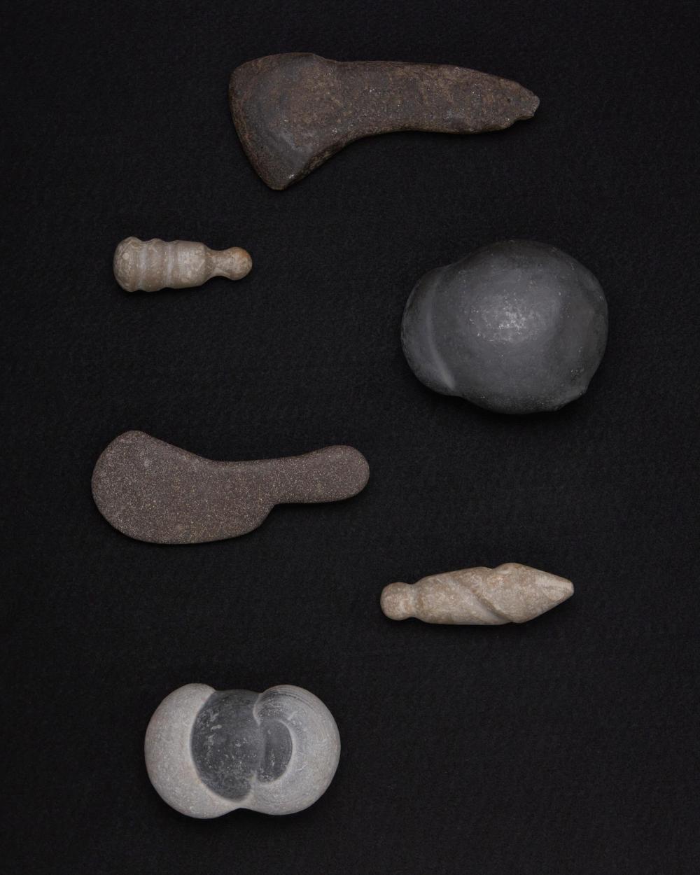 A GROUP OF CARVED STONE ECCENTRICSA