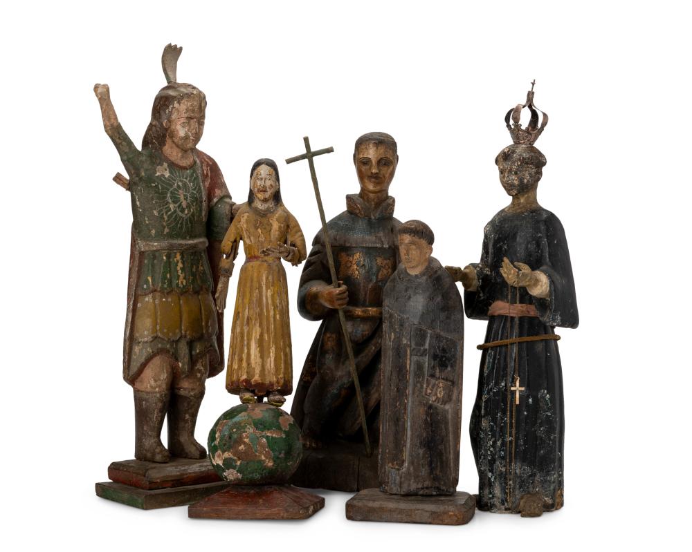 A GROUP OF CARVED WOOD SANTOS