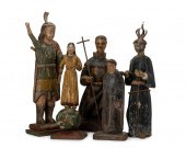 A GROUP OF CARVED WOOD SANTOS
