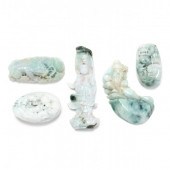 A GROUP OF CHINESE JADE CARVIN