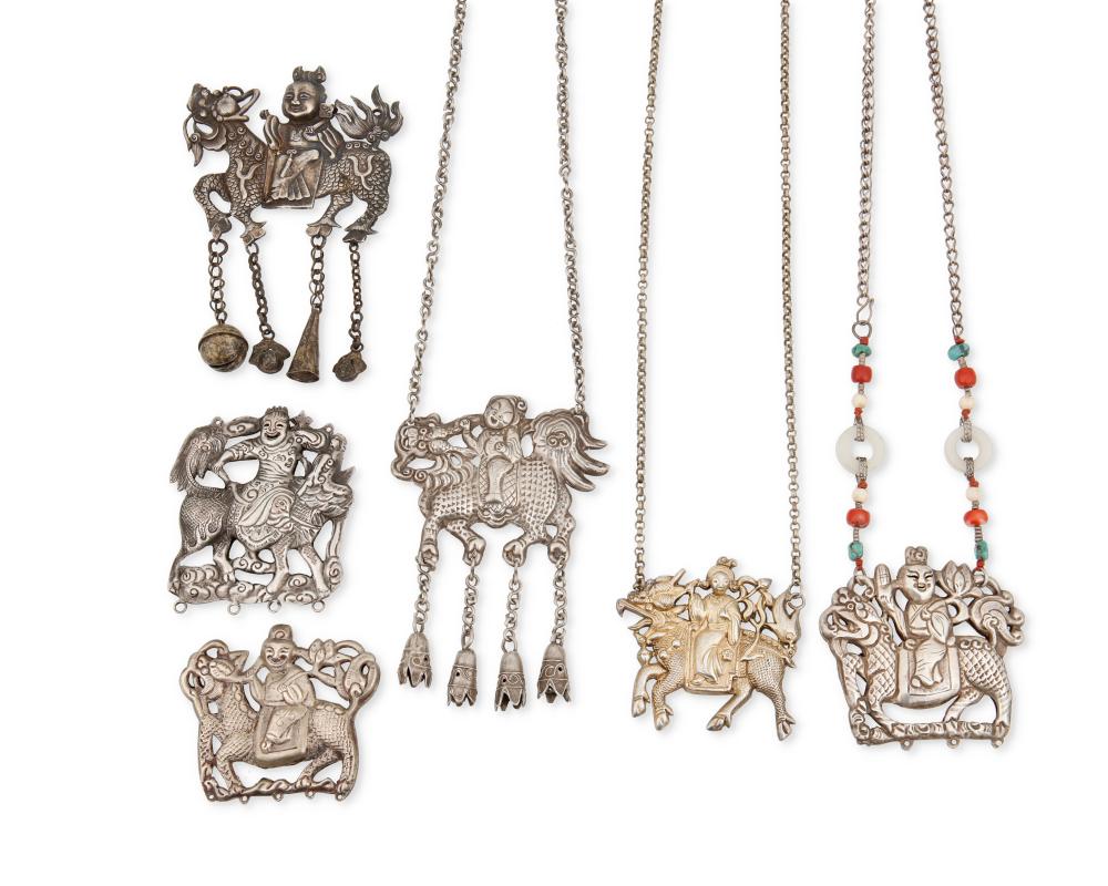 A GROUP OF CHINESE SILVER QILIN