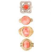 A GROUP OF CORAL AND GOLD RING