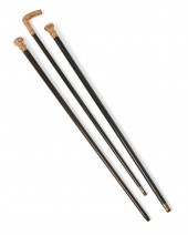 A GROUP OF EBONIZED WOOD WALKI