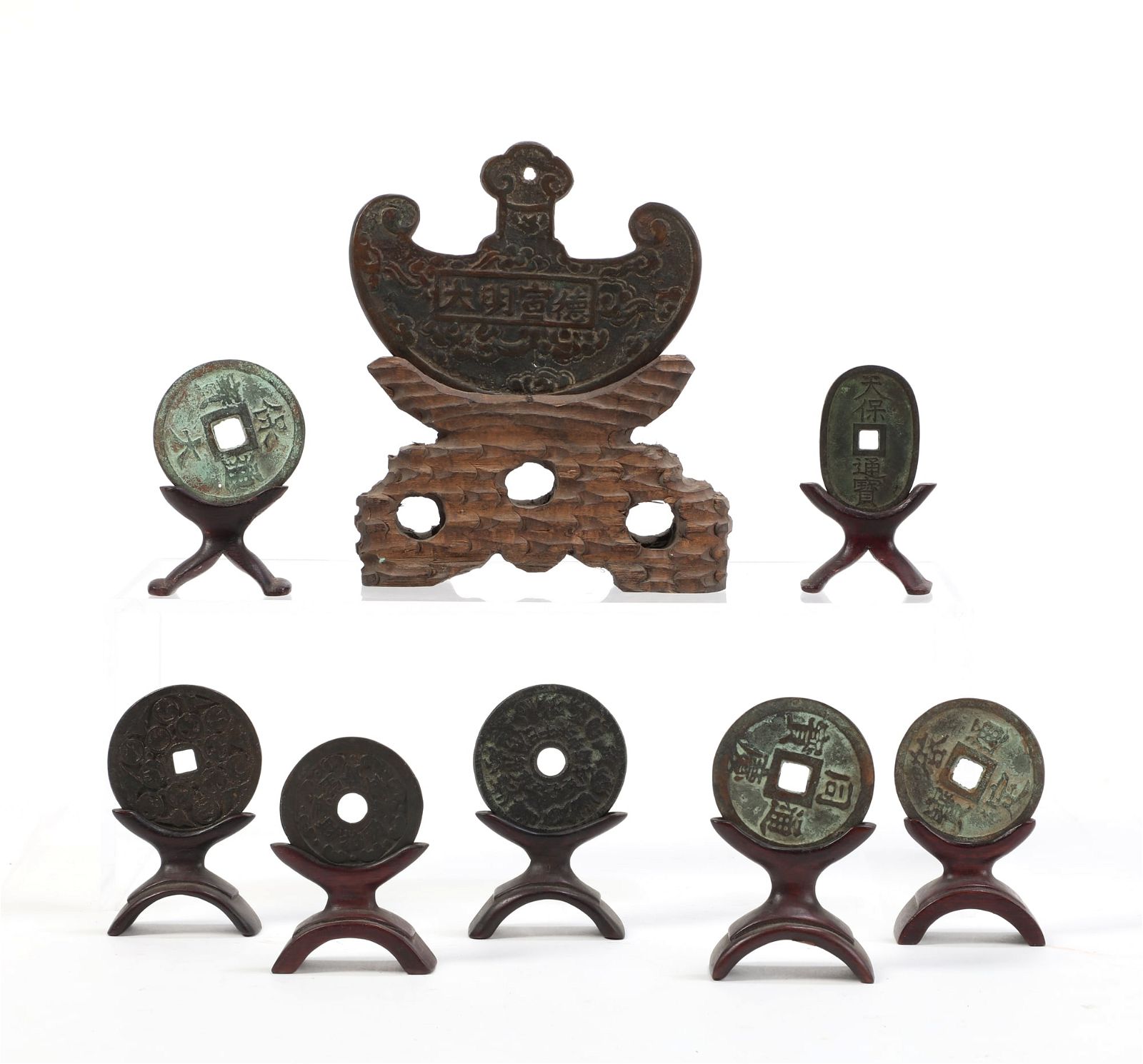 A GROUP OF EIGHT ASIAN BRONZE