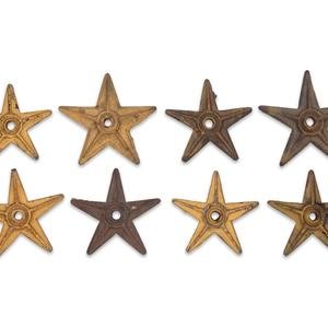 A Group of Eight Cast Metal Stars