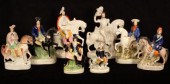 A group of eight Staffordshire